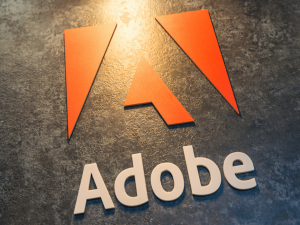 Auf dem Bild ist das Logo von Adobe (einem Softwareunternehmen) zu sehen